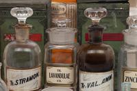 A Collection of Glass Apothecary Bottles