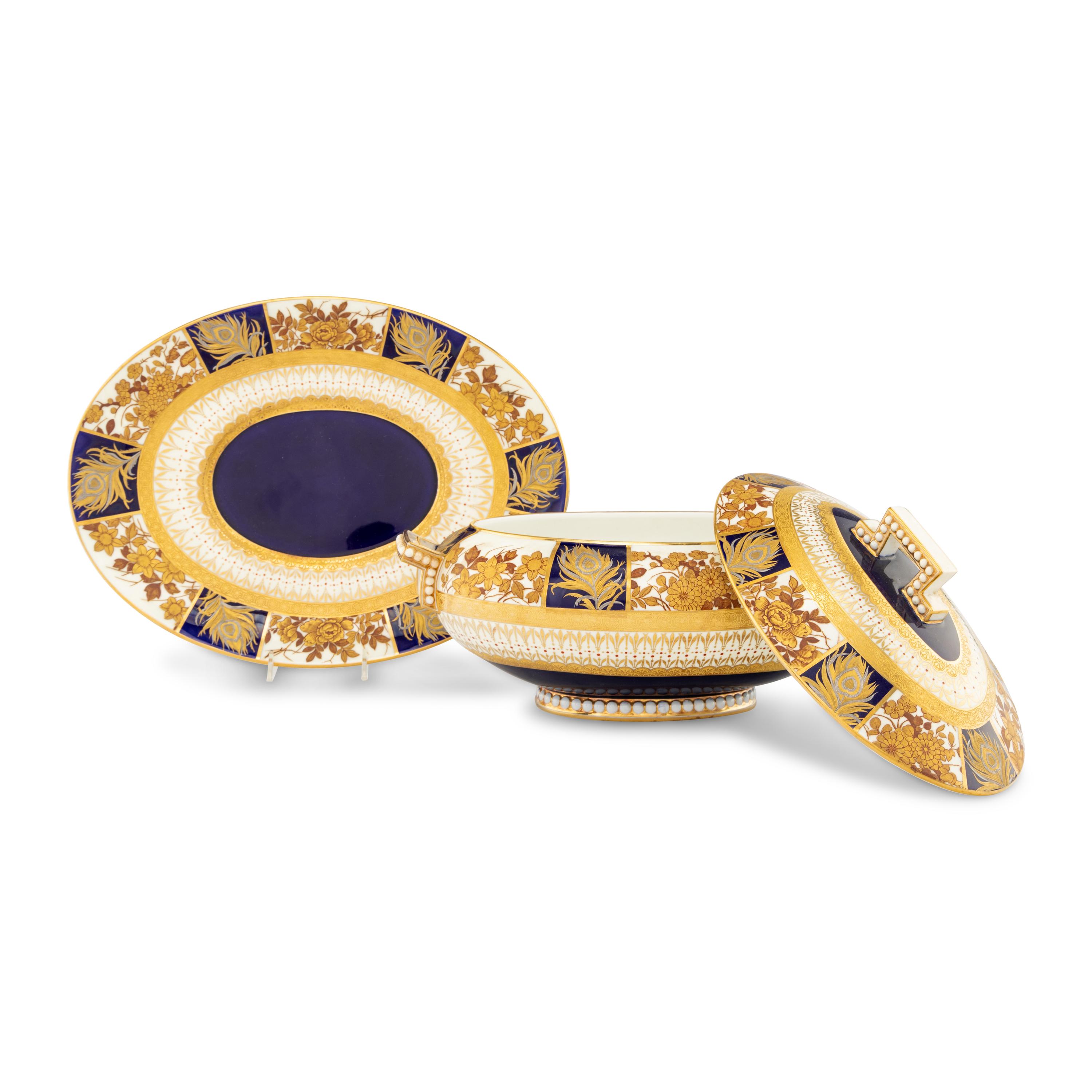 An Aesthetic Movement Parcel-Gilt Porcelain Table Service
