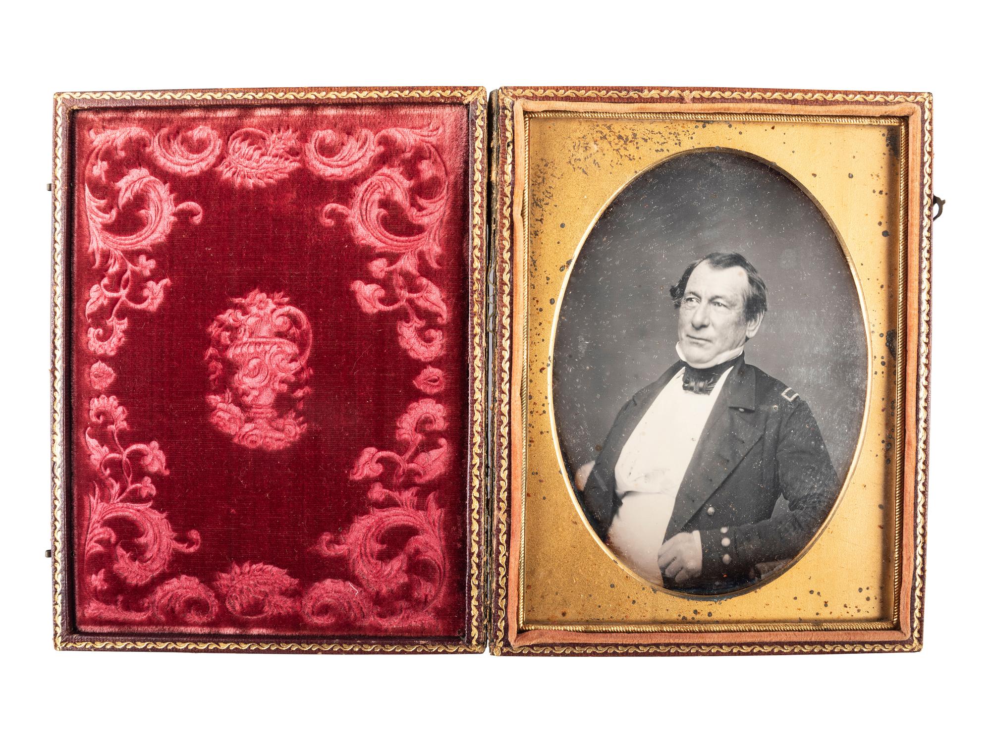 [EARLY PHOTOGRAPHY] -- [MILITARIA]. Half plate daguerreotype of American ship's master.