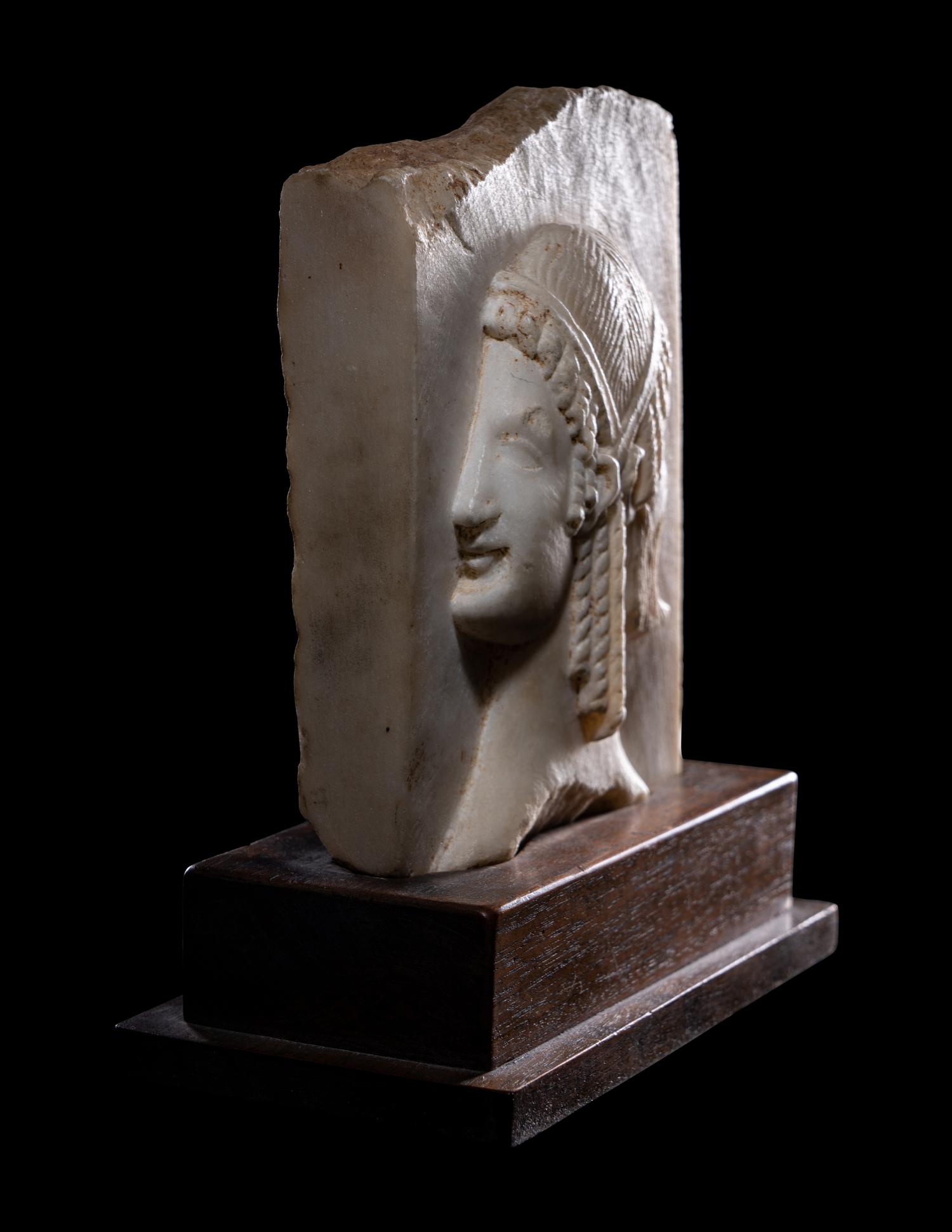 A Neoclassical Marble Relief Fragment with Janus
