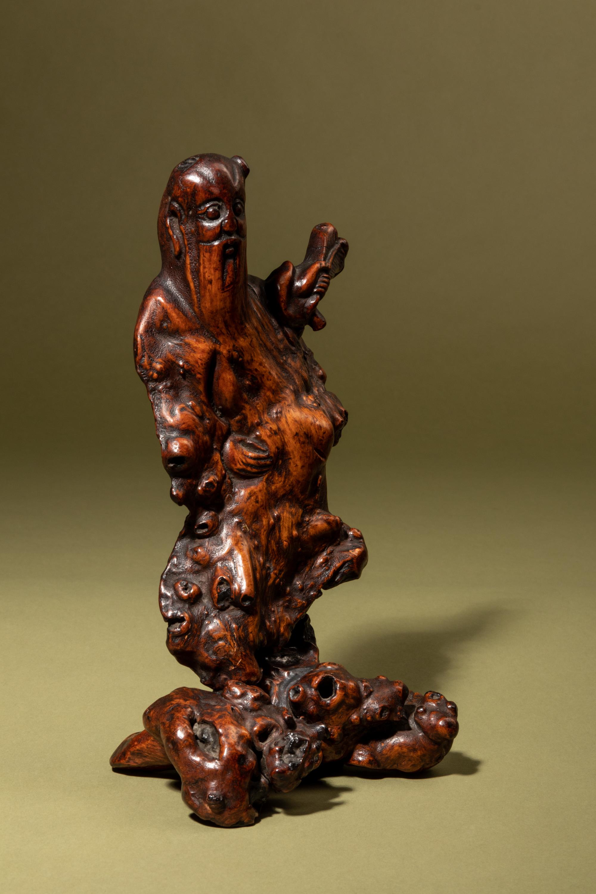 A Carved Natural Root Figure of an Immortal