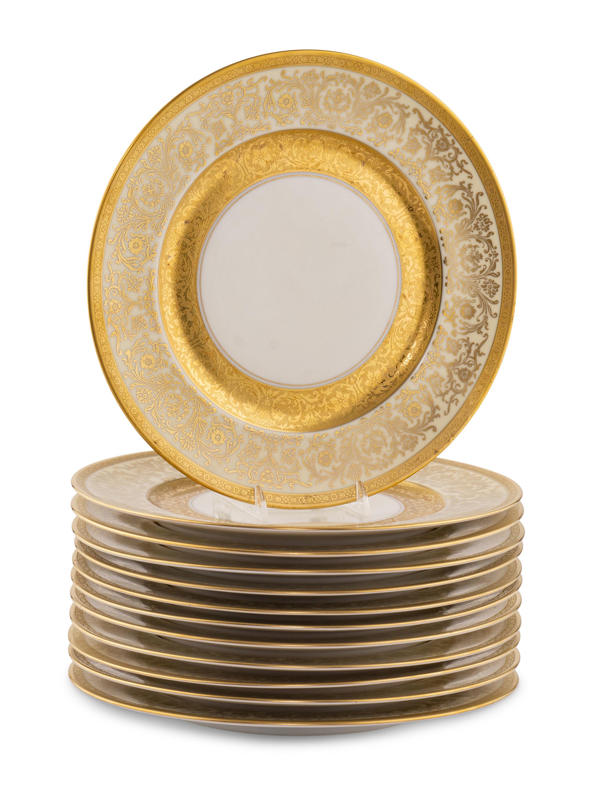 A Set of Twelve Bavarian Gilt Decorated Porcelain Plates
