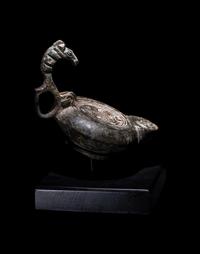 A Roman Bronze Oil Lamp