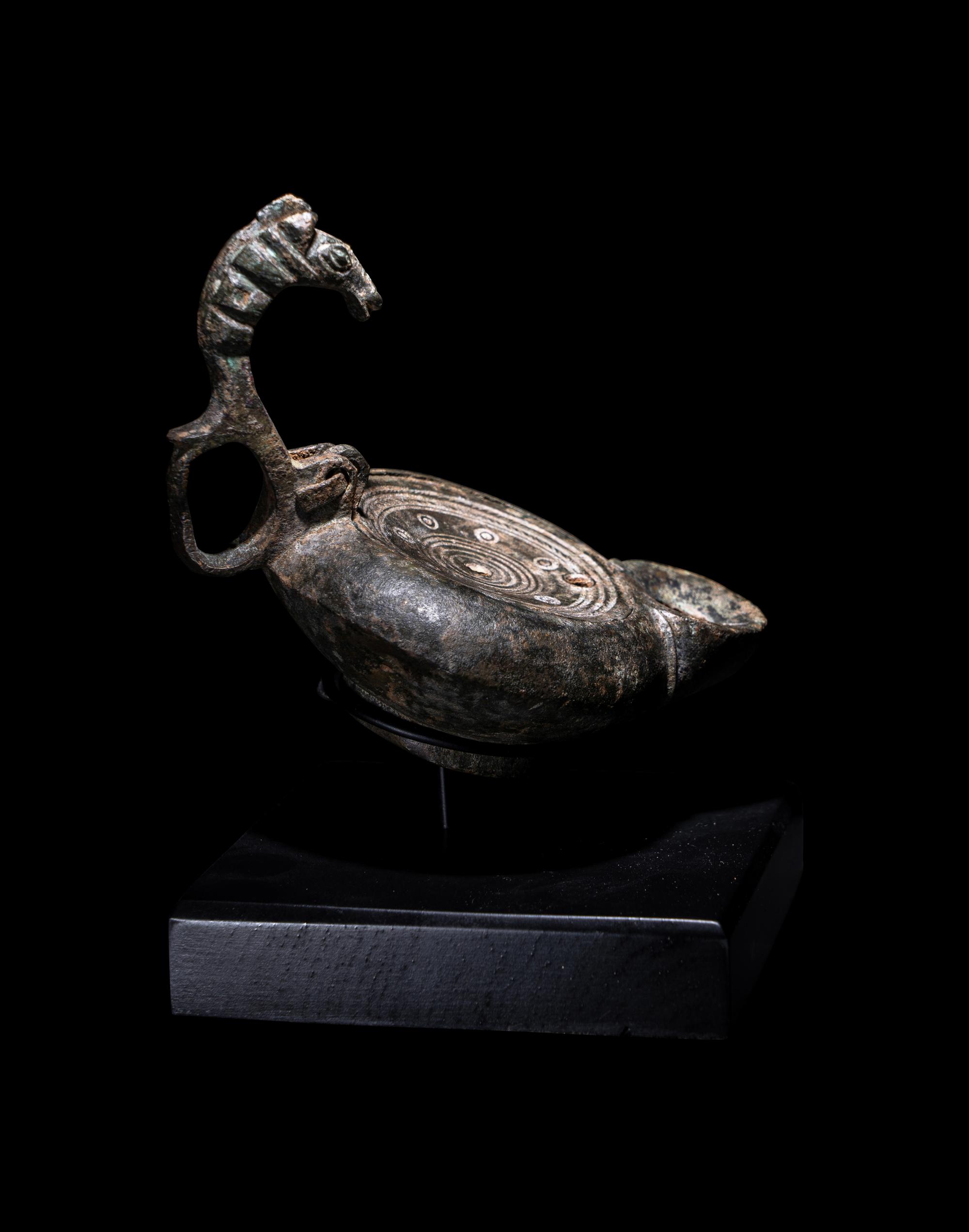 A Roman Bronze Oil Lamp