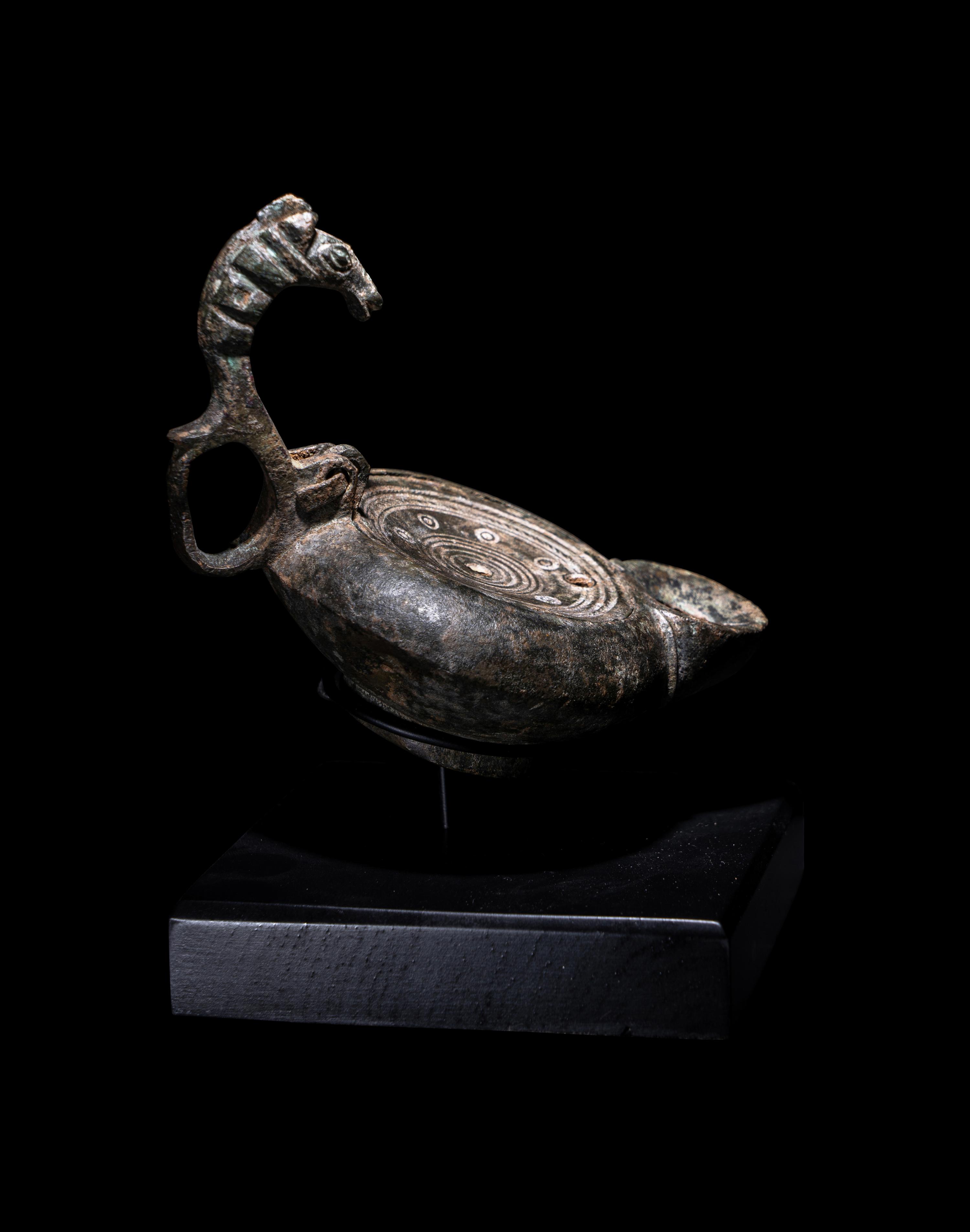 A Roman Bronze Oil Lamp
