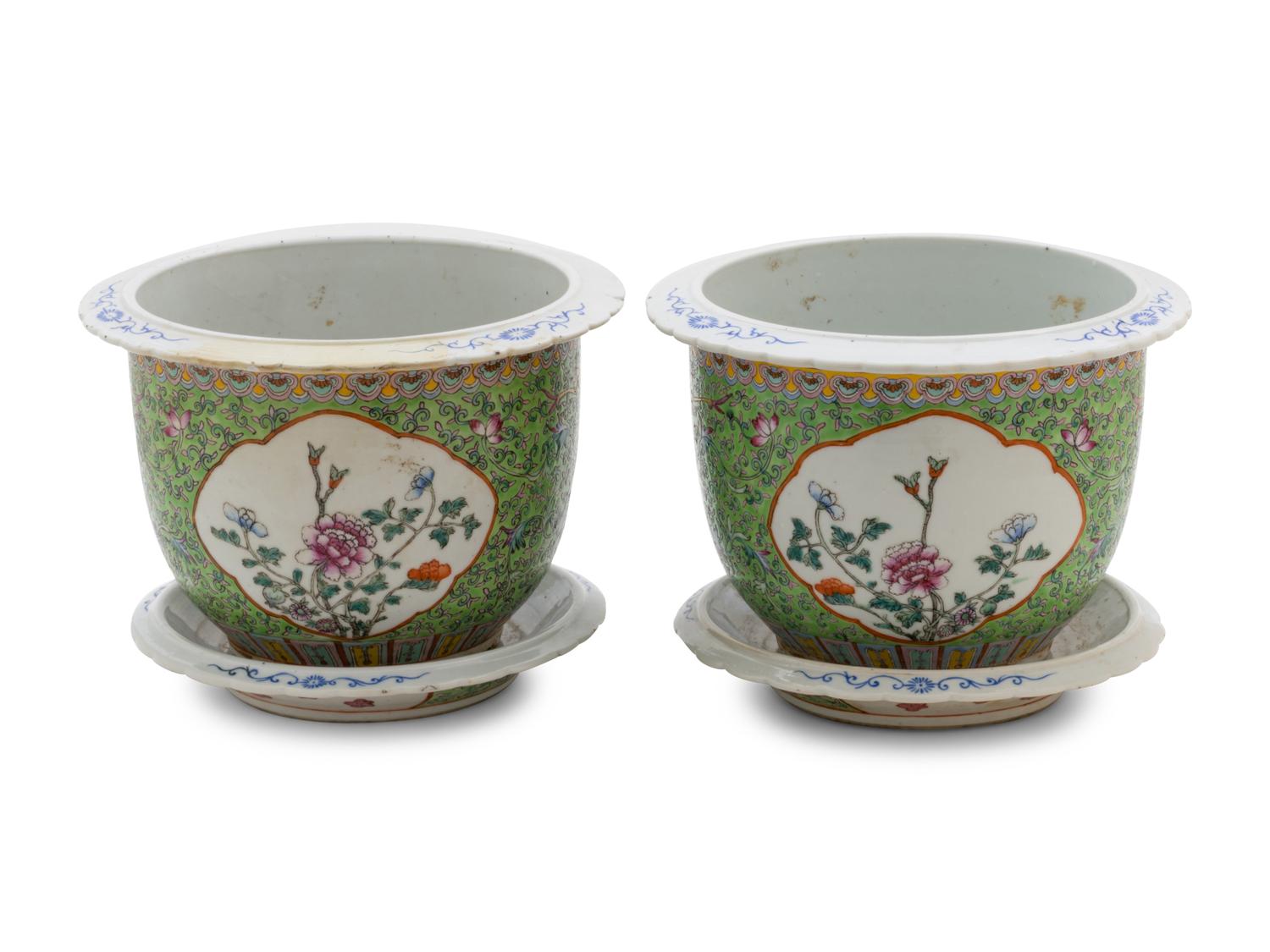 A Pair of Apple Green Ground Famille Rose Flower Pots and Stands