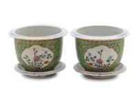 A Pair of Apple Green Ground Famille Rose Flower Pots and Stands