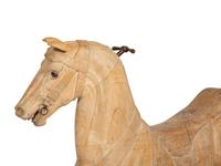 A Pair of Italian Carved Wood Carousel Horses in the Manner of Gustav Dentzel