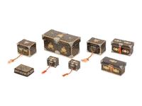 Eight Japanese Gilt and Black Lacquered Boxes