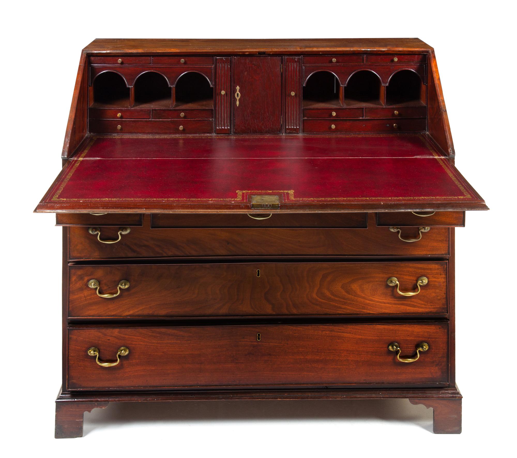 A George III Mahogany Slant-Front Secretary Height 44 3/4 x width 48 x depth 22 1/2 inches. — LATE 18TH CENTURY