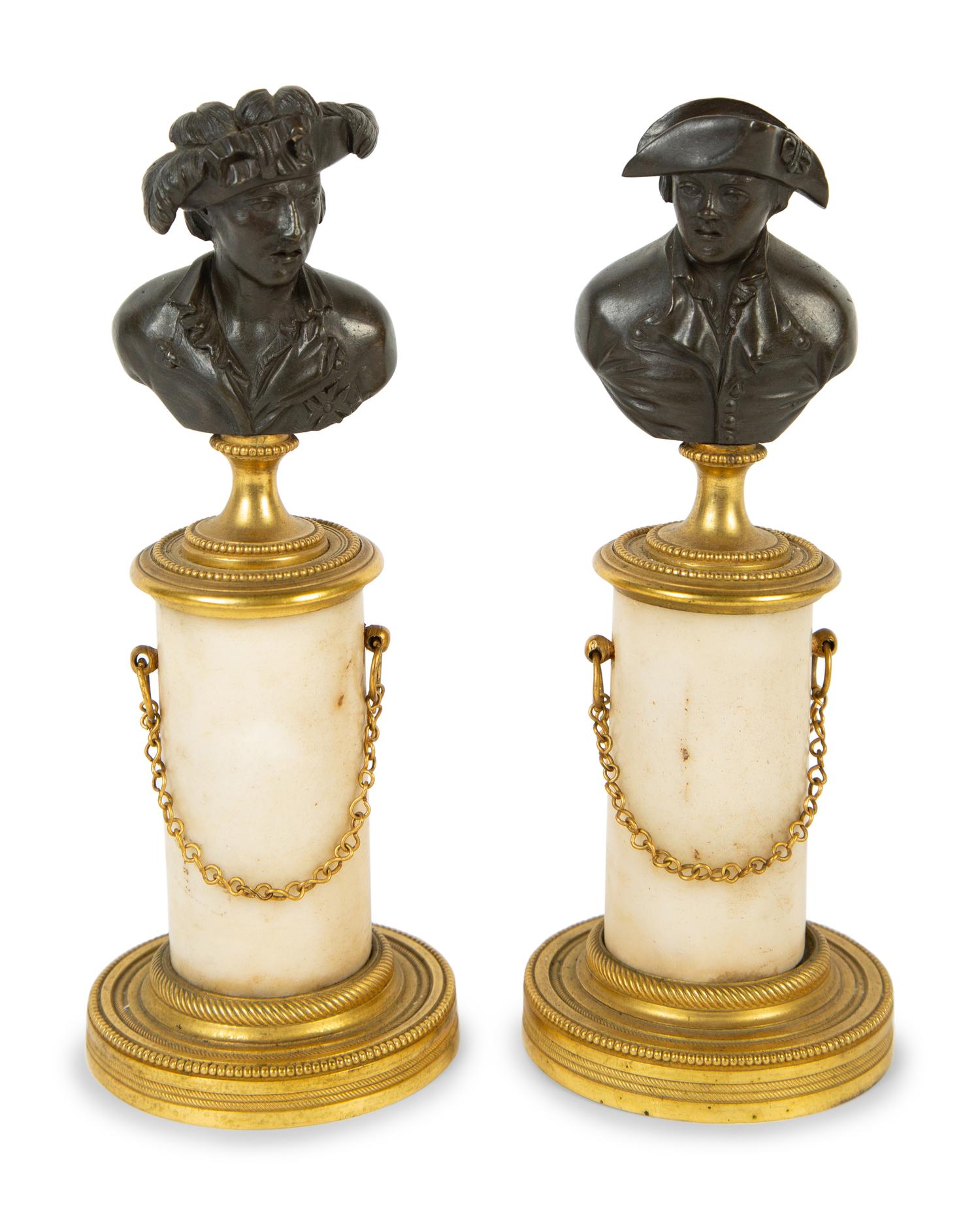 A Pair of French Bronze and Marble Small Busts