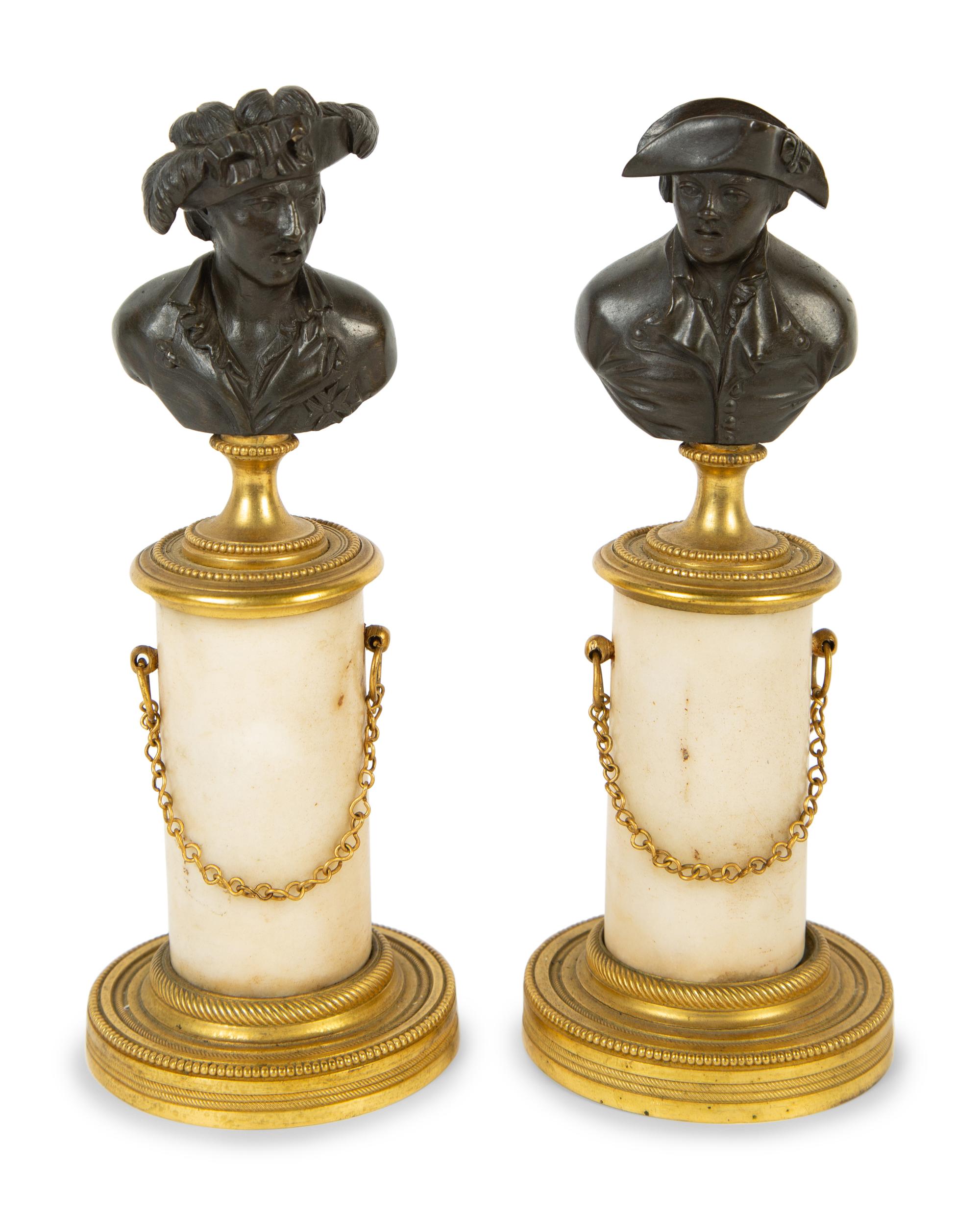 A Pair of French Bronze and Marble Small Busts