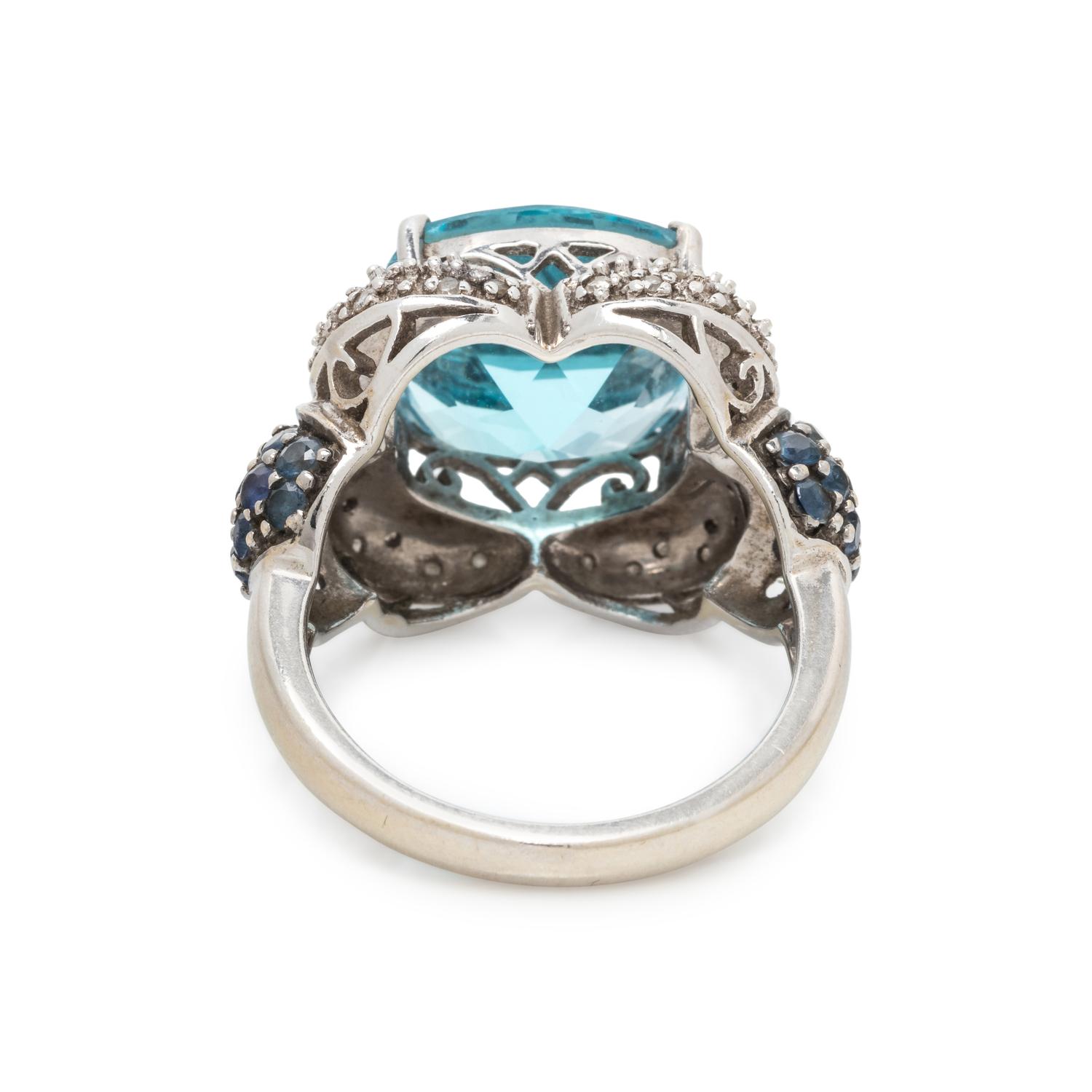 BLUE TOPAZ, DIAMOND AND SAPPHIRE RING