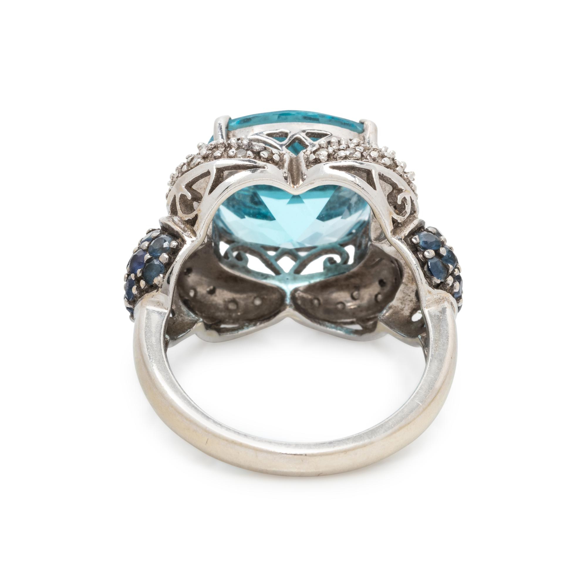 BLUE TOPAZ, DIAMOND AND SAPPHIRE RING