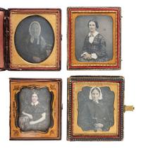 [EARLY PHOTOGRAPHY]. 22 sixth plate daguerreotypes of women posed with books and cased images.