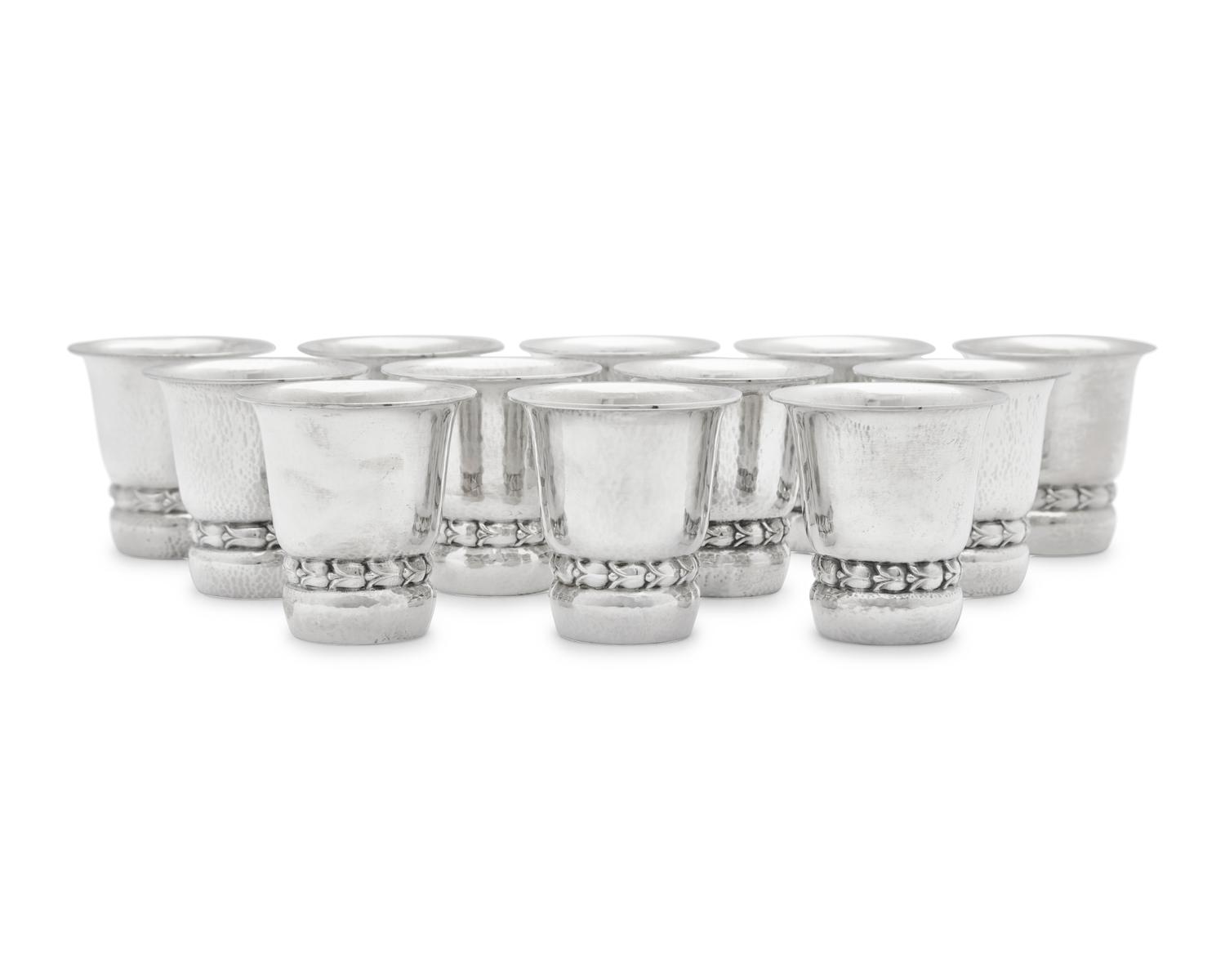 A Set of Twelve Georg Jensen Silver Beakers