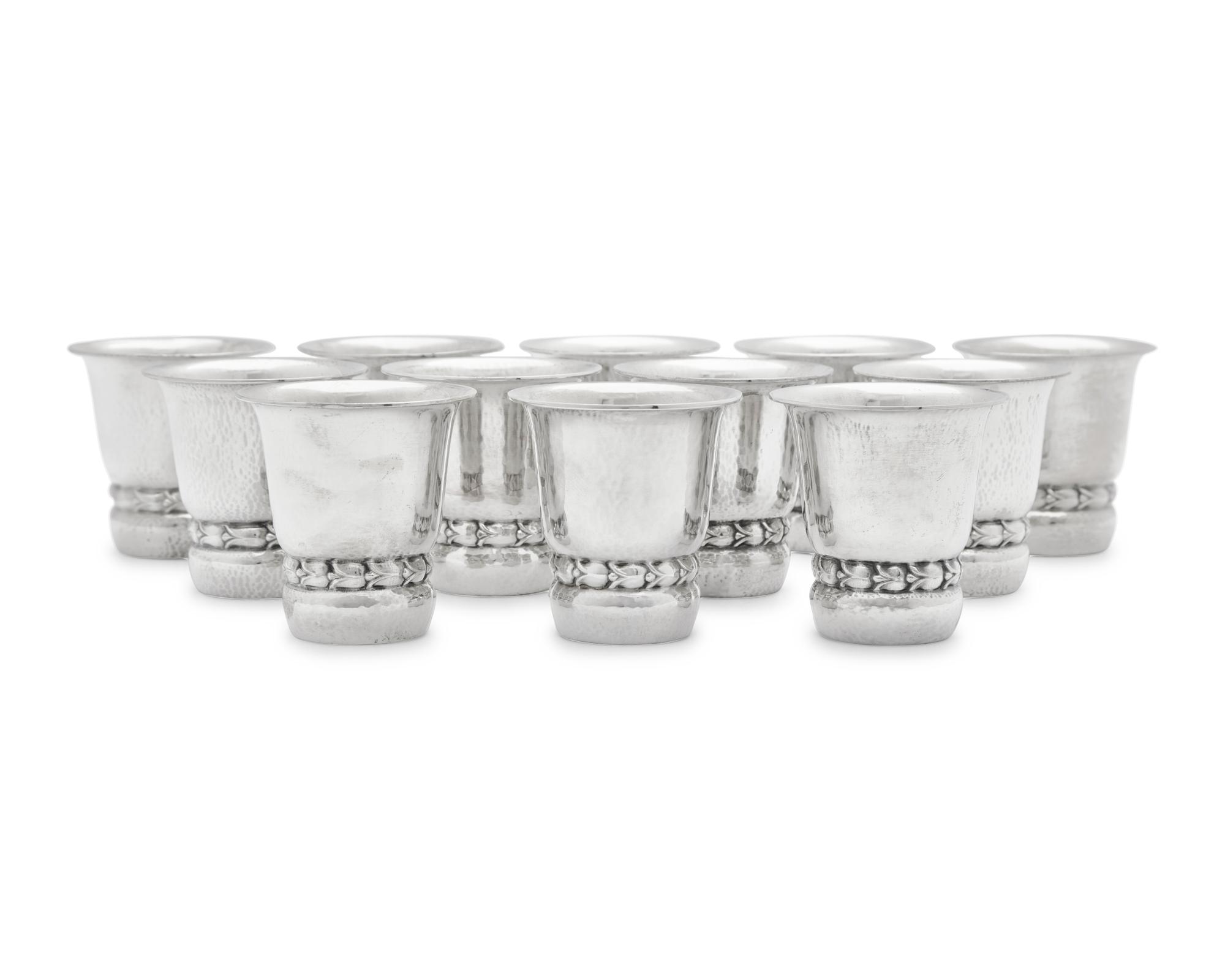 A Set of Twelve Georg Jensen Silver Beakers