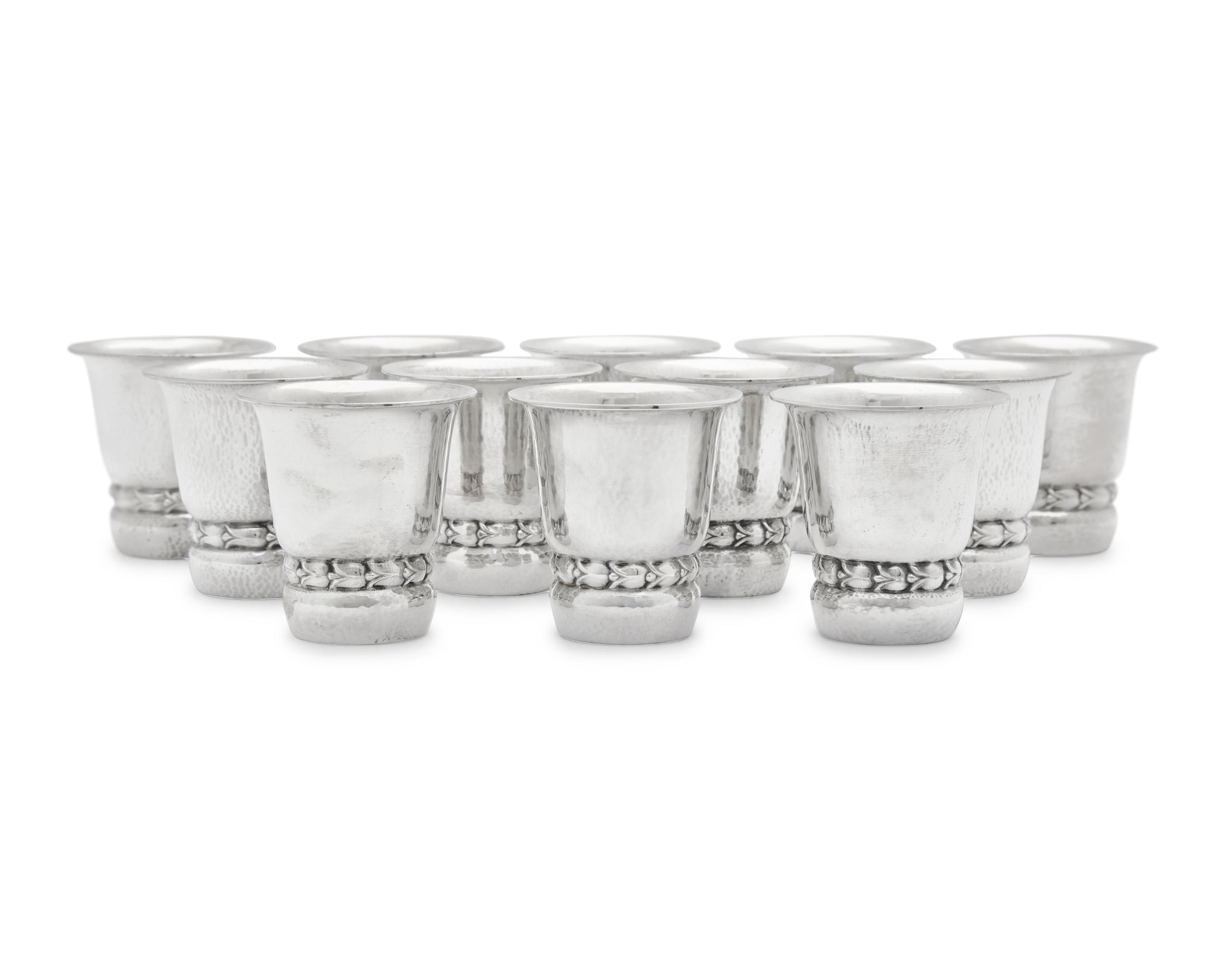 A Set of Twelve Georg Jensen Silver Beakers