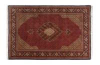 A Tabriz Wool Rug — 20TH CENTURY