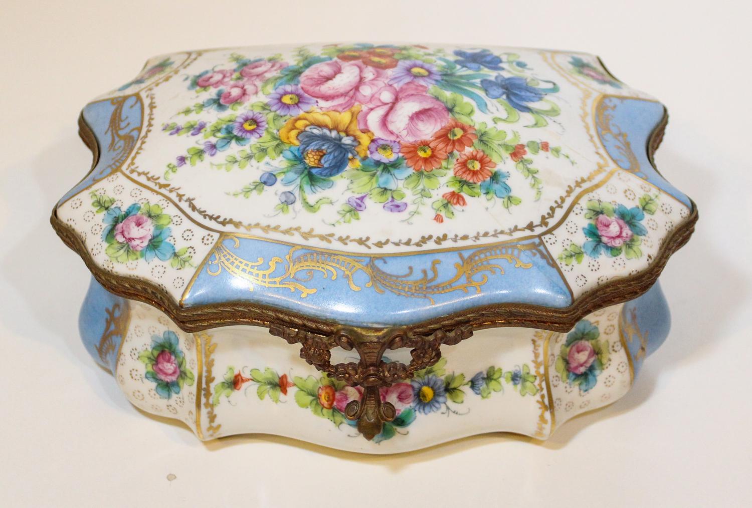 A Sevres Style Porcelain Table Casket. Width 9 3/4 inches.