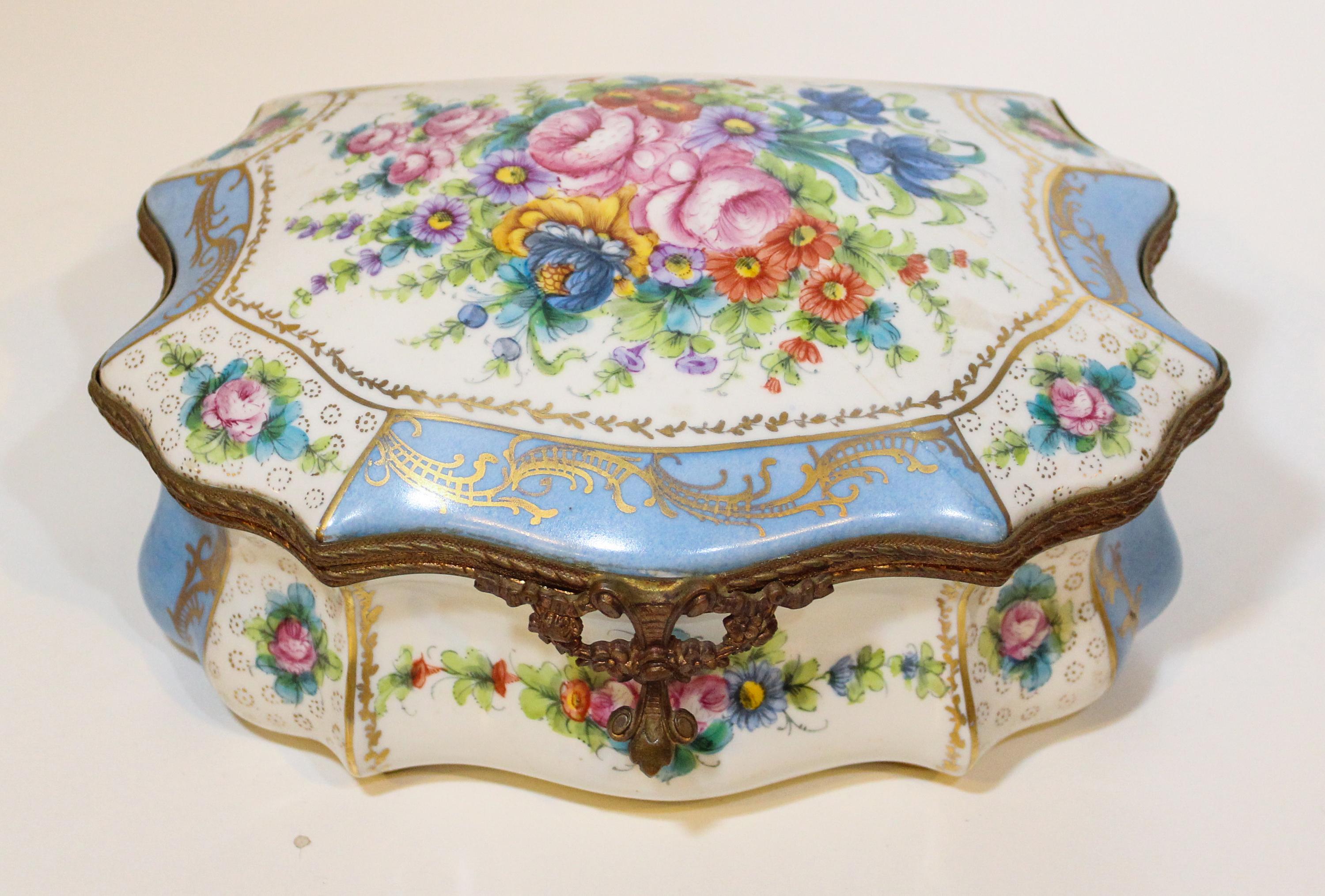 A Sevres Style Porcelain Table Casket. Width 9 3/4 inches.
