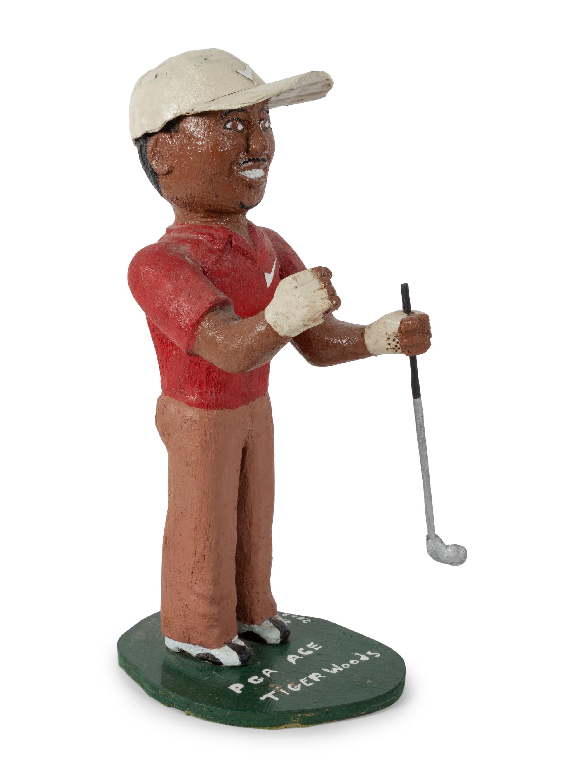 A Folk Art Carved and Painted Tiger Woods Figure, by Bill Potts