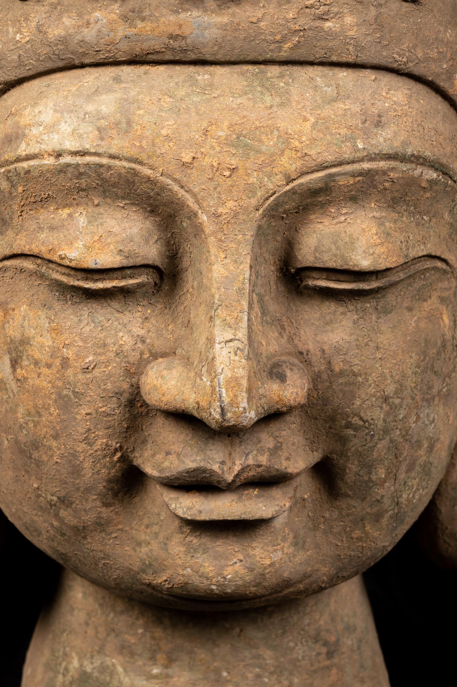 A Chinese Monumental Carved Stone Head