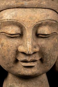 A Chinese Monumental Carved Stone Head