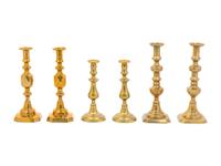 Three Pairs of English Brass Candlesticks