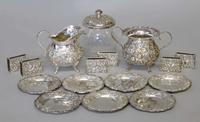 Group of sterling silver repoussé matchbooks and ashtrays s. kirk & son, baltimore, md, 20th century