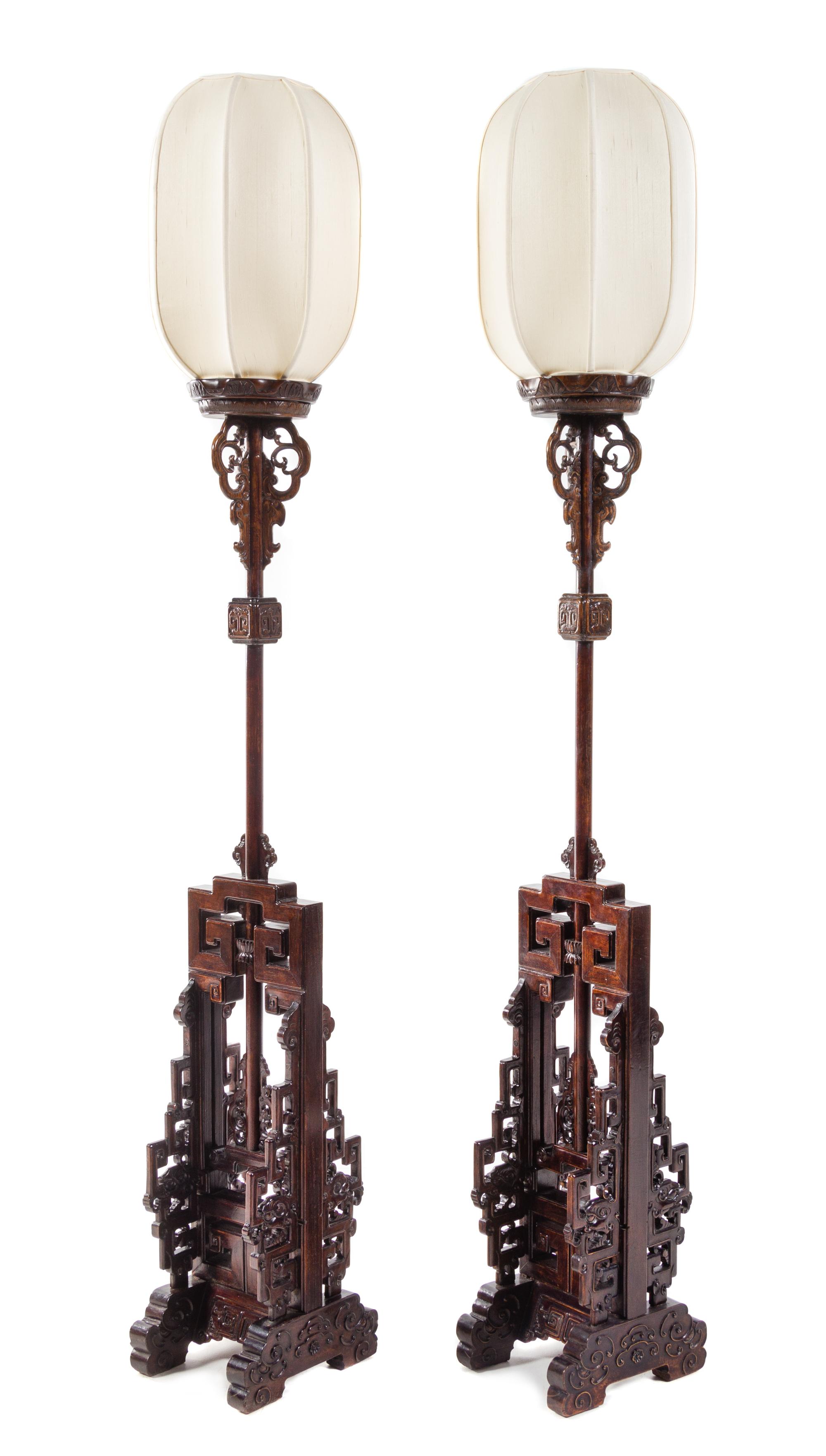 A Pair of Chinese Hongmu Lamp Stands, Dengtai Height of stand 60 3/4 inches. — LATE QING DYNASTY