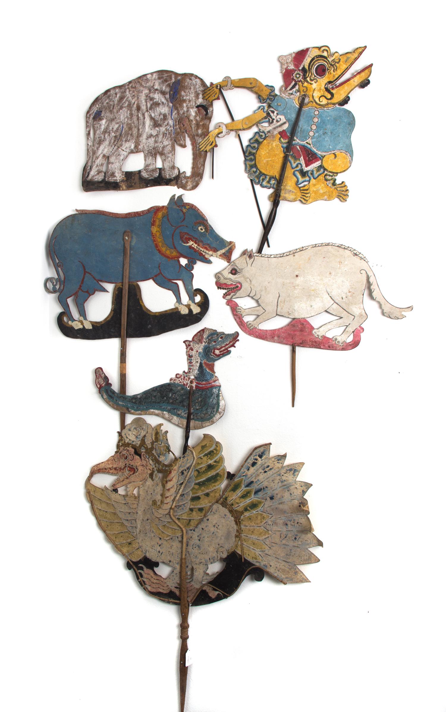 A Collection of Six Indonesian Wayang Kulit Shadow Puppets Height of tallest 24 inches. — 20TH CENTURY