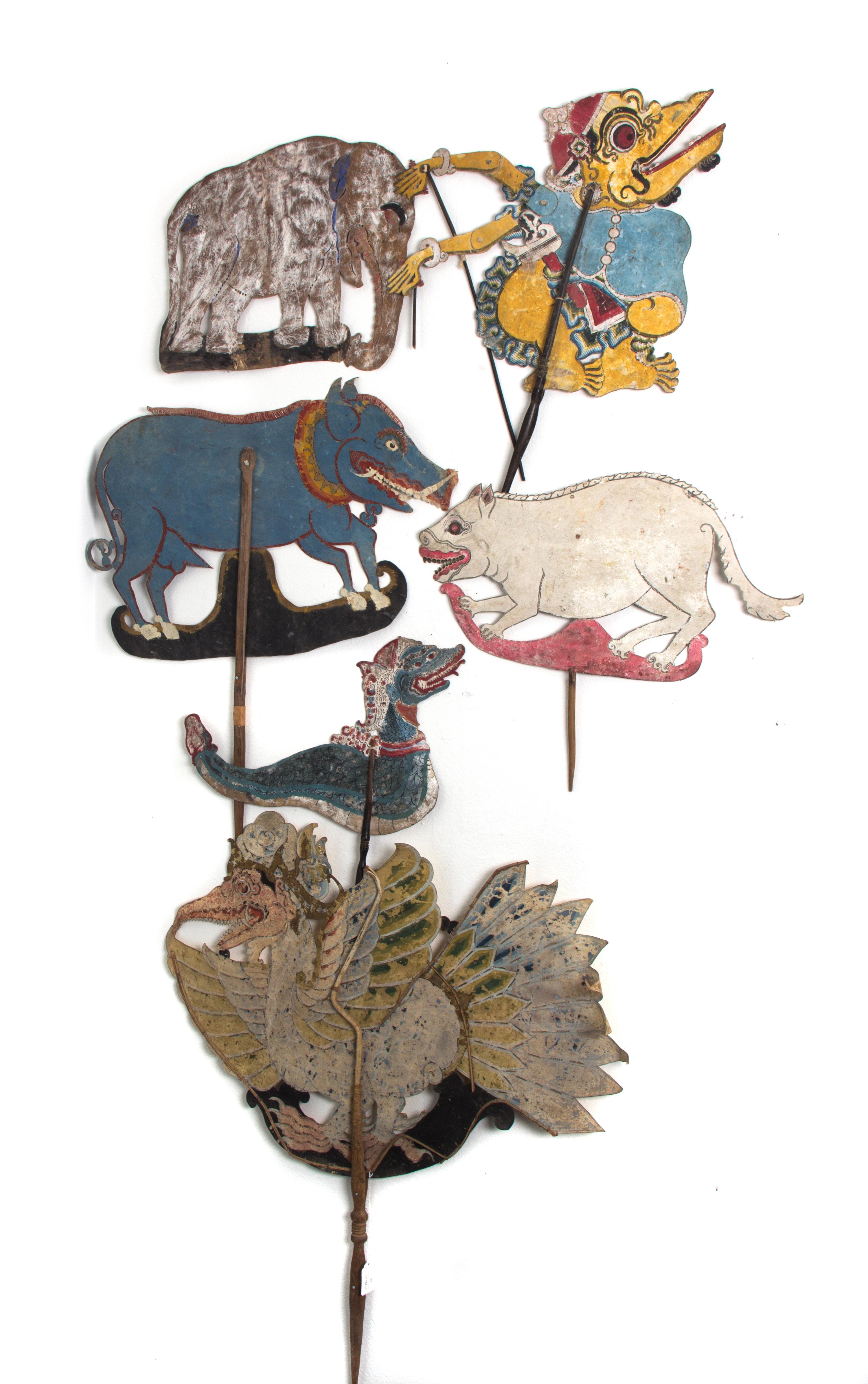 A Collection of Six Indonesian Wayang Kulit Shadow Puppets Height of tallest 24 inches. — 20TH CENTURY