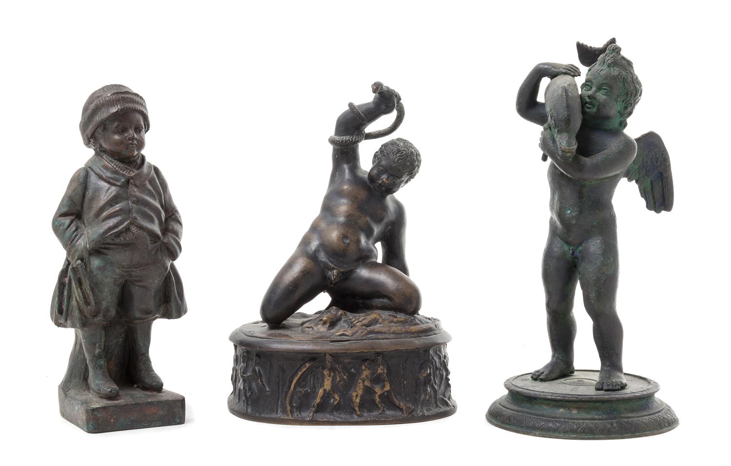 Three Cast Metal Figures Height of first 8 7/8 inches.