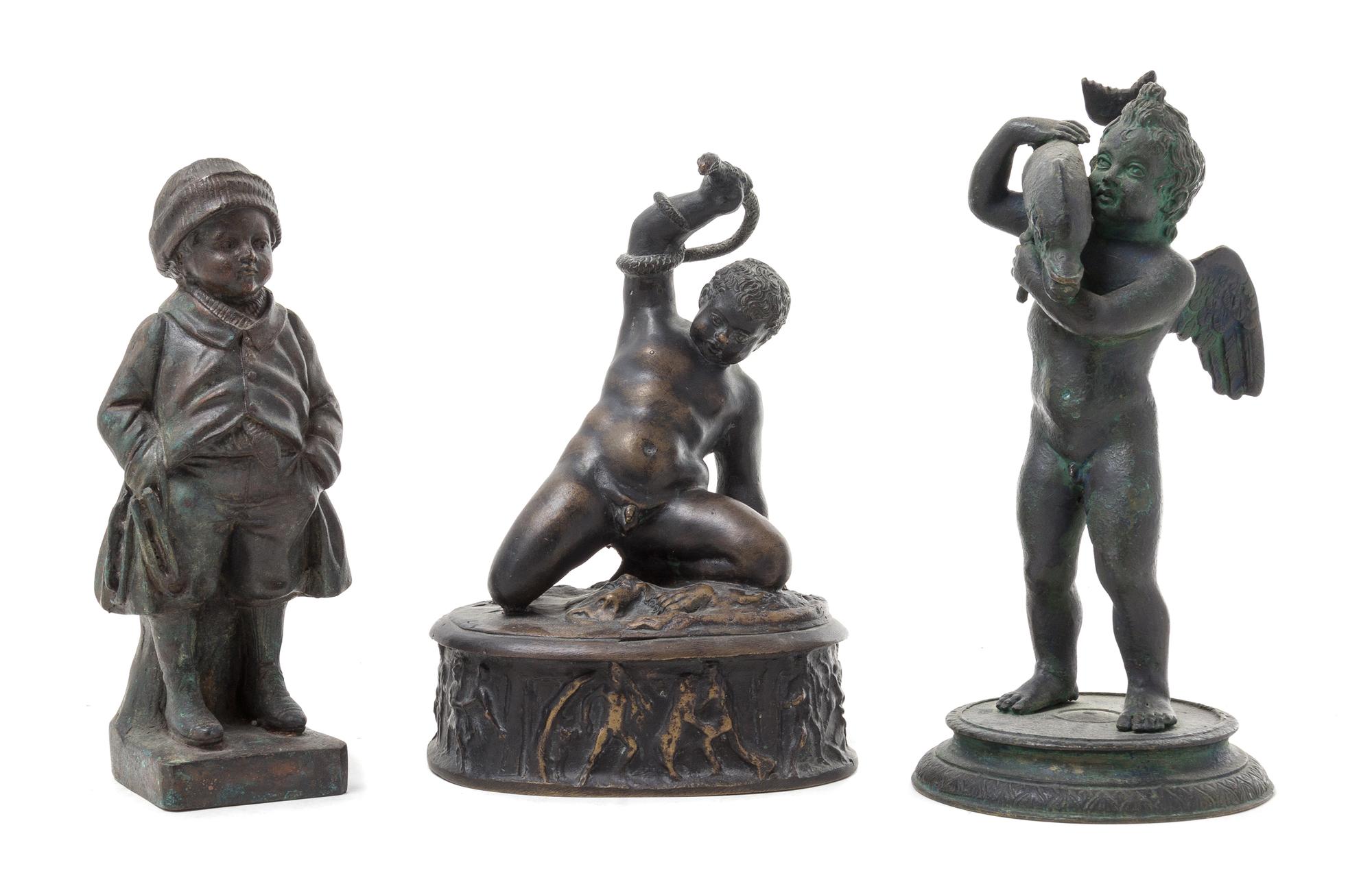 Three Cast Metal Figures Height of first 8 7/8 inches.