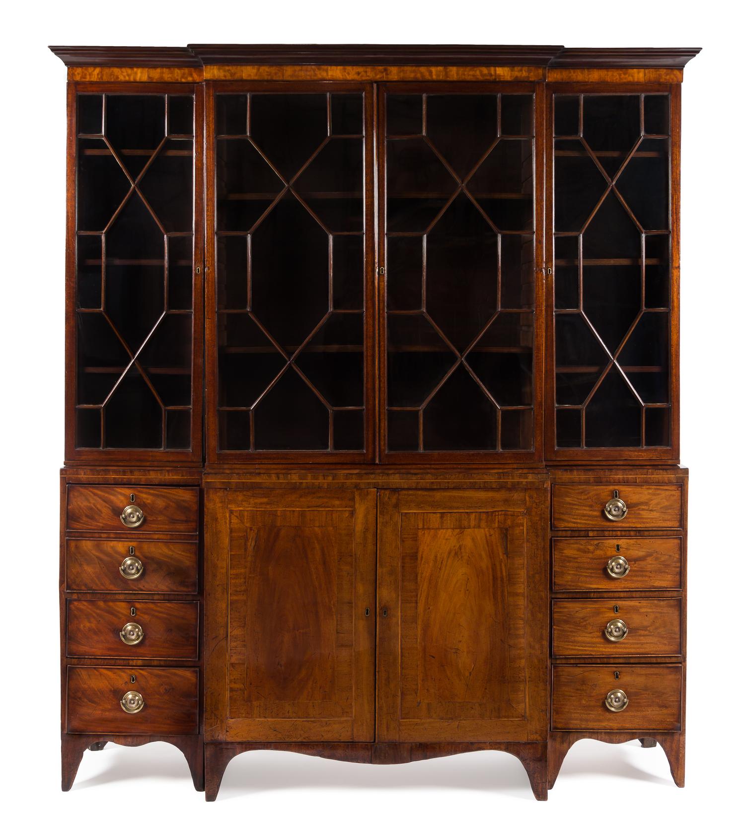 A George III Mahogany Breakfront Bookcase Height 85 3/4 x width 72 1/4 x depth 15 1/4 inches. — LATE 18TH CENTURY