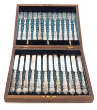 An English Silver-plate Fruit Service for Twelve Length of knives 8 3/4 inches. — 20TH CENTURY