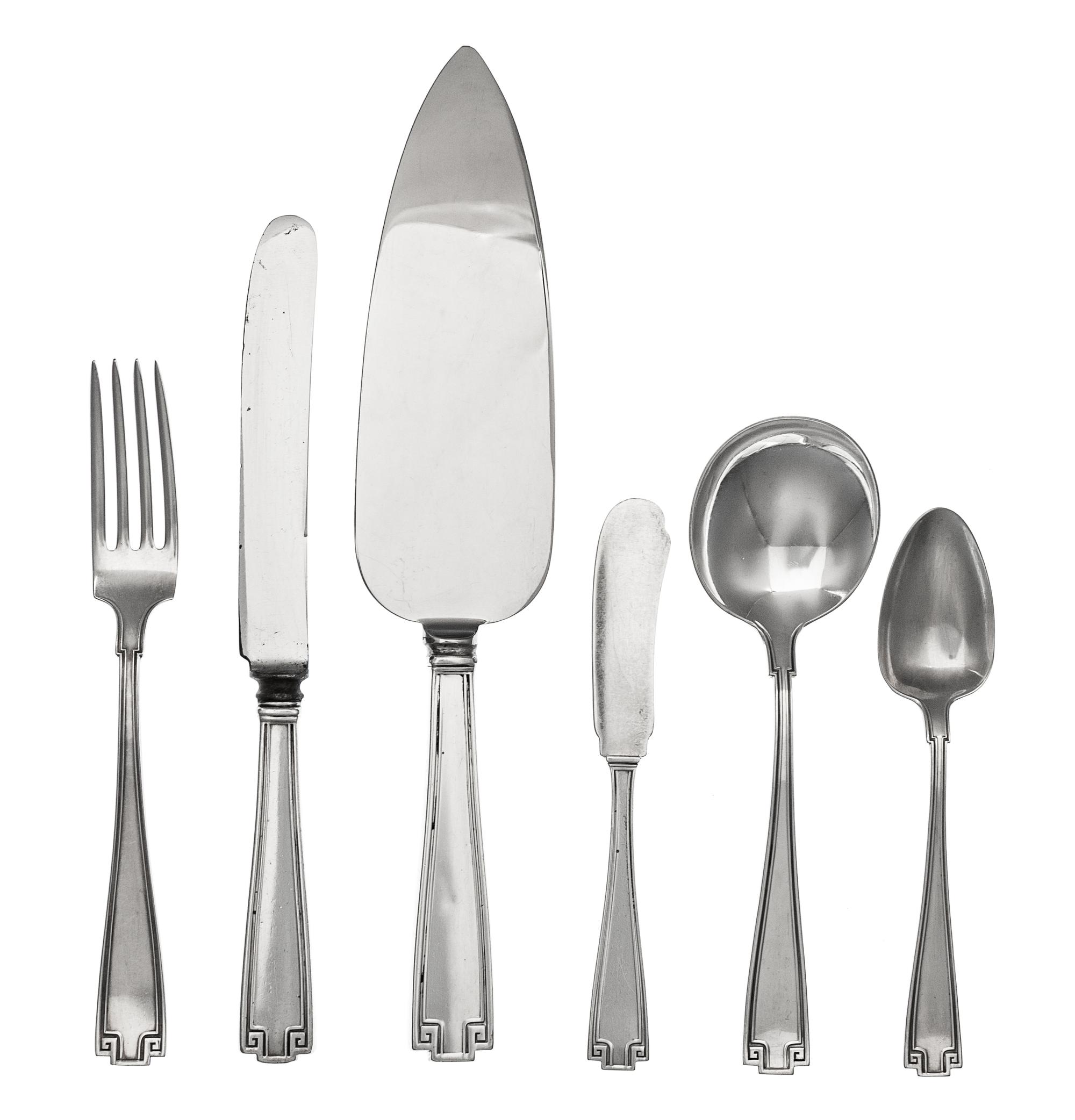 An American Silver Flatware Service, Gorham Mfg. Co., Providence, RI, Etruscan pattern, comprising: 11 dinner knives 11 dinner forks 12