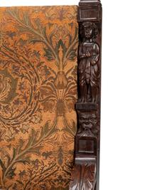 A Pair of Flemish Baroque Style Carved Walnut Armchairs