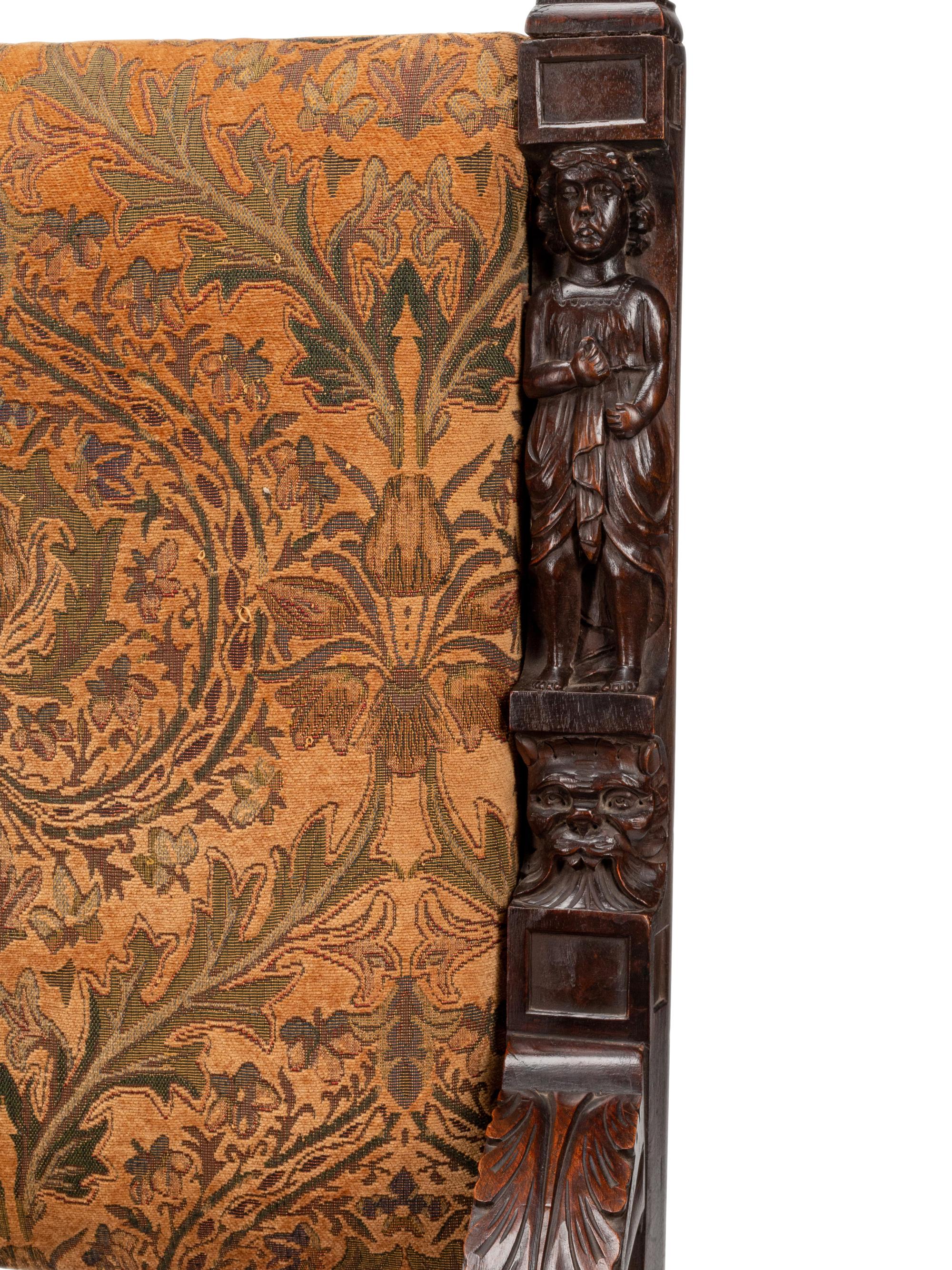 A Pair of Flemish Baroque Style Carved Walnut Armchairs