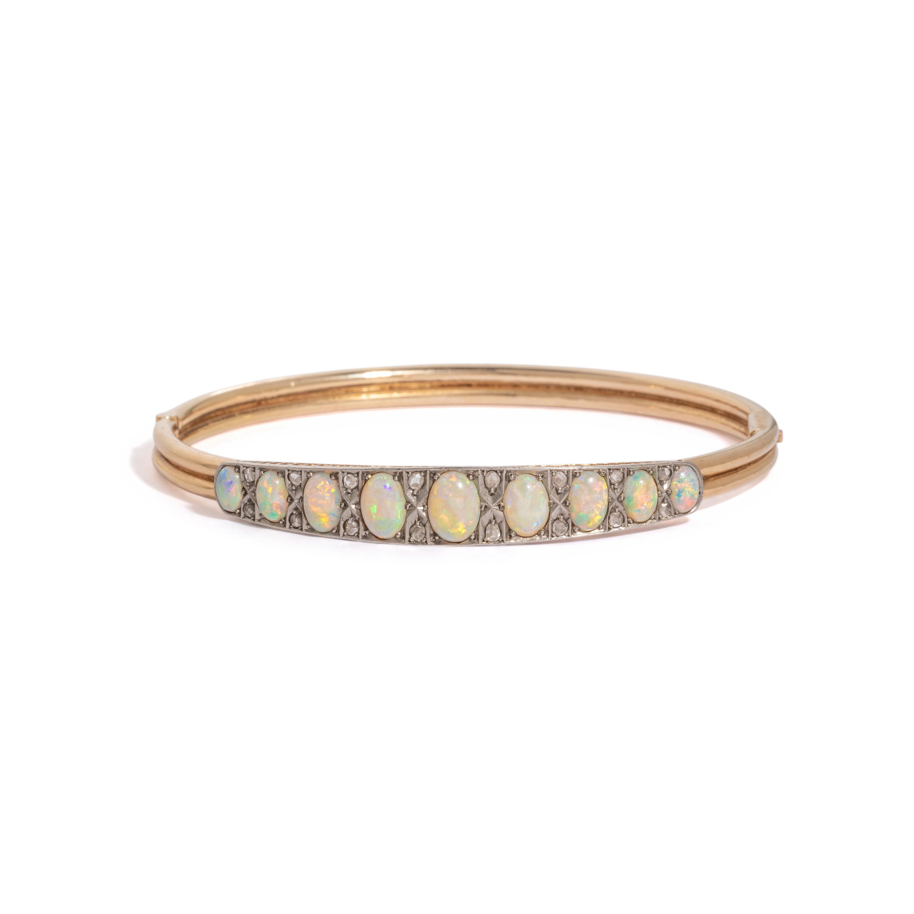 GOLD, OPAL, AND DIAMOND BANGLE BRACELET