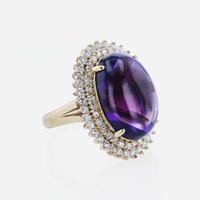 An 18K Yellow Gold, Amethyst, and Diamond Ring