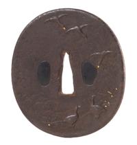 An Iron Tsuba Height 3 1/4 inches.