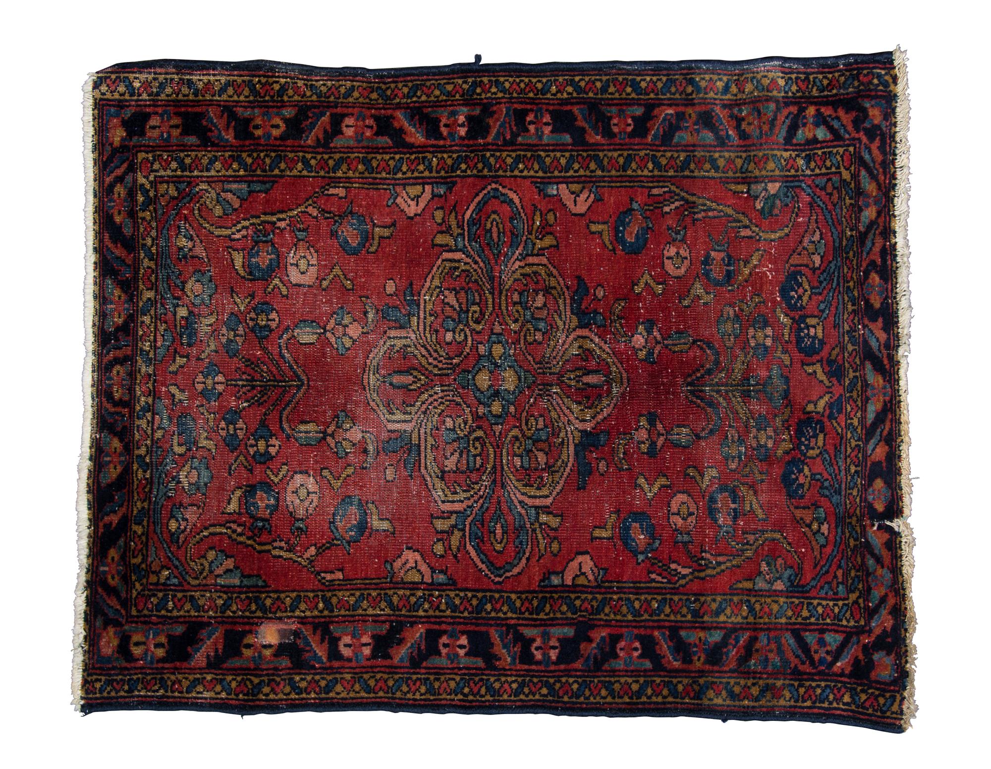 A Persian Wool Rug 2 feet 7 inches x 3 feet 3 inches.