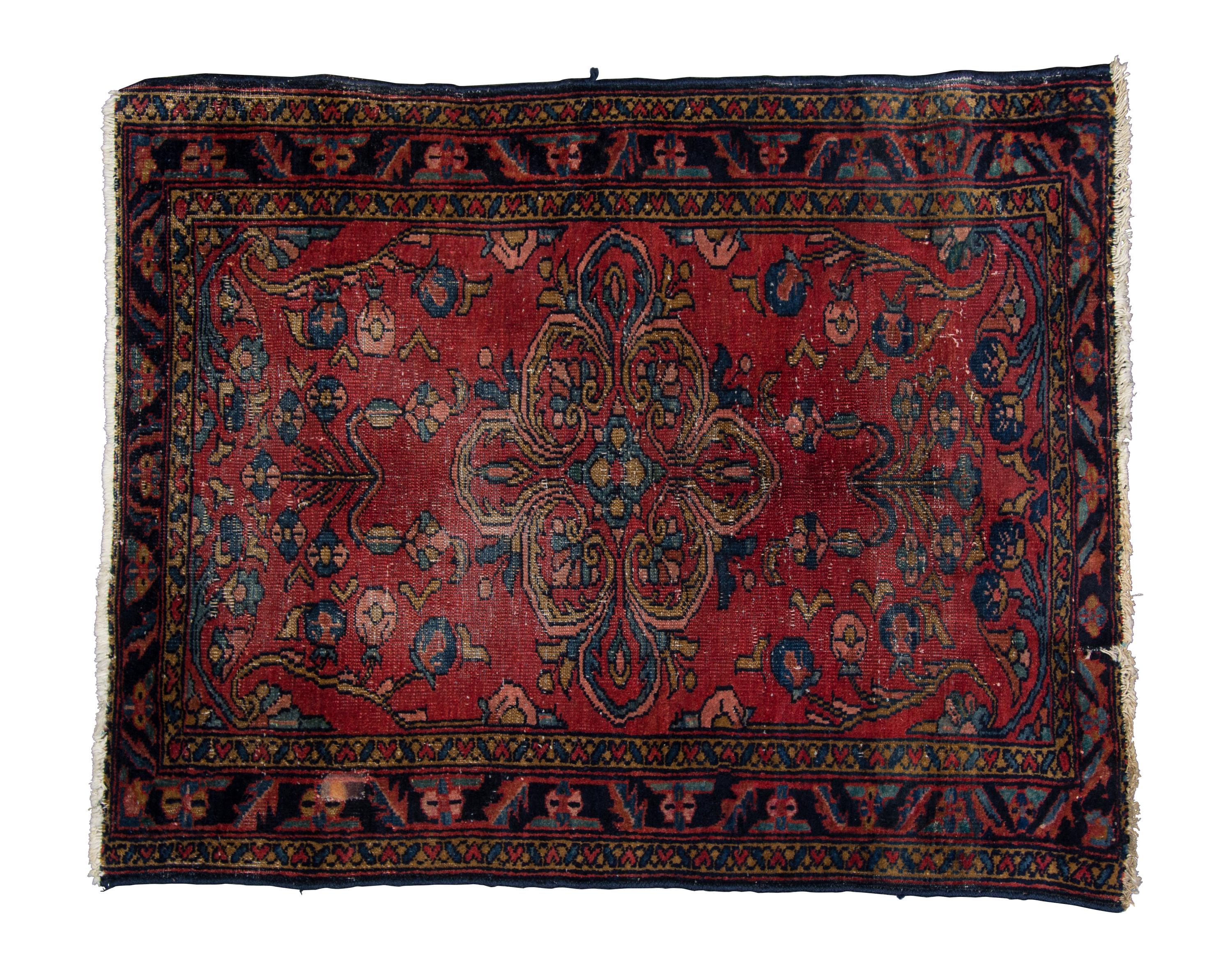 A Persian Wool Rug 2 feet 7 inches x 3 feet 3 inches.