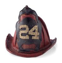 [CALIFORNIA] -- [FIREFIGHTING]. Fire helmet, badges, photographs, and more associated with San Francisco firefighter Ernest Nelson, Engine Co. No. 42, ca 1910-1930s.