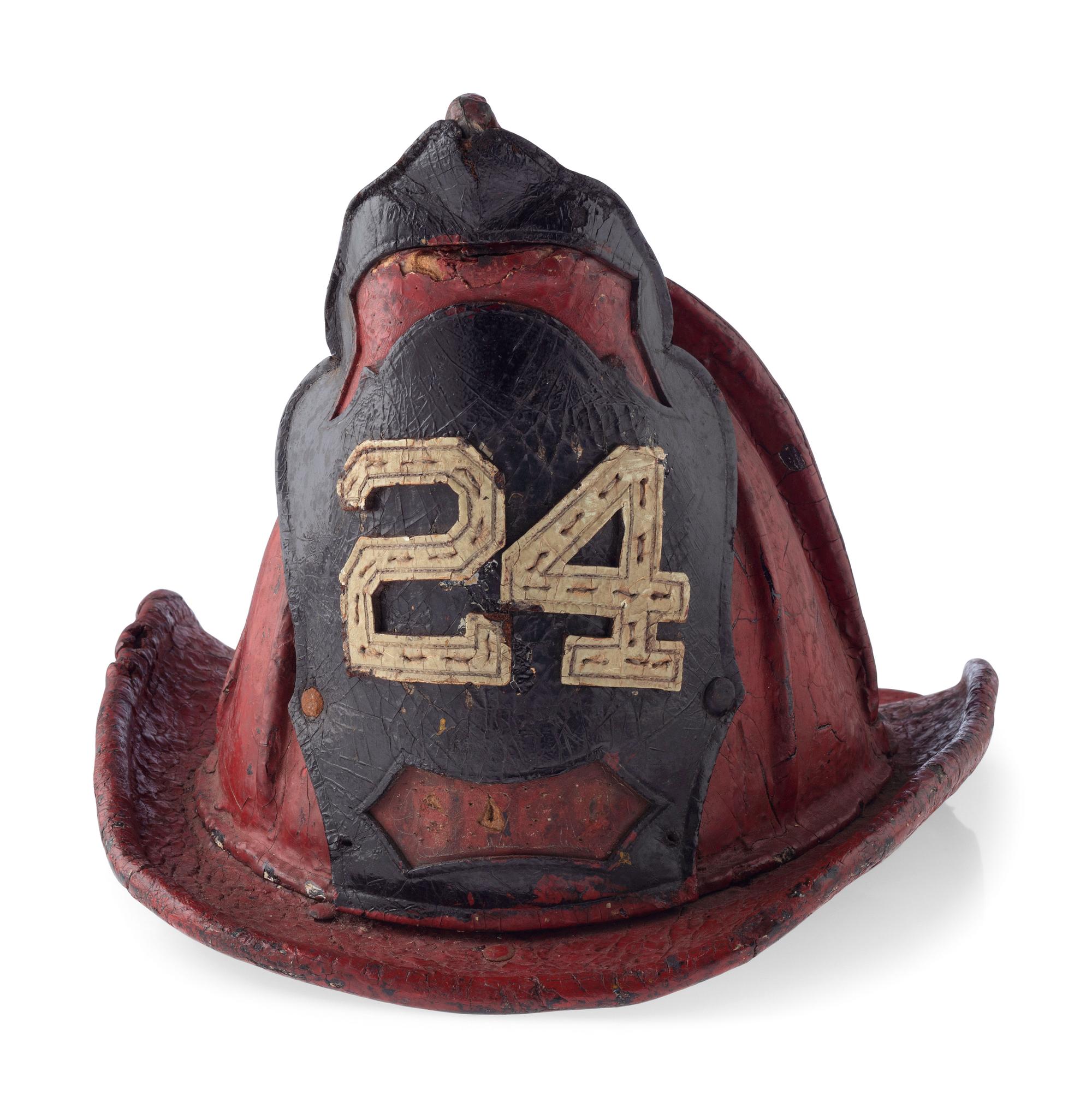 [CALIFORNIA] -- [FIREFIGHTING]. Fire helmet, badges, photographs, and more associated with San Francisco firefighter Ernest Nelson, Engine Co. No. 42, ca 1910-1930s.