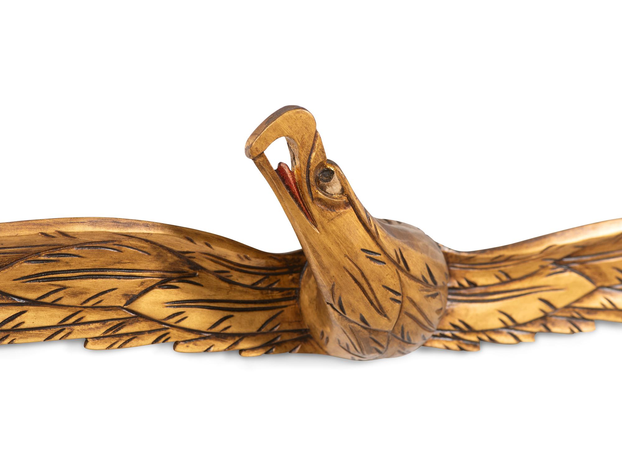 A Carved and Gold-Painted Wood Eagle