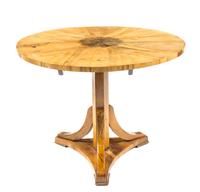 A Biedermeier Birch Center Table — CIRCA 1830