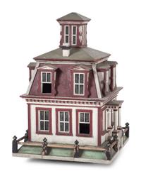 A Folk Art Painted Birdcage in the Form of a House